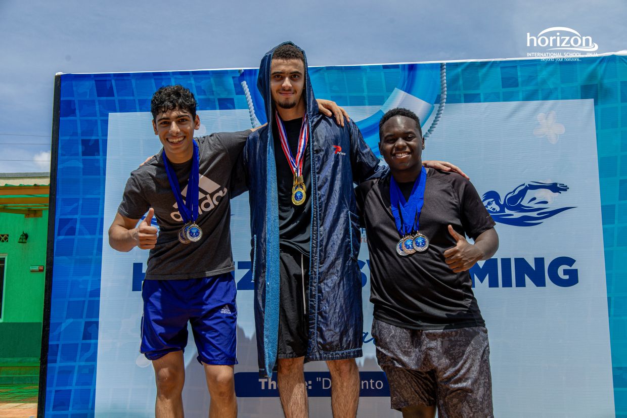 Top boys medalists celebrating after the Horizon Swimming Gala